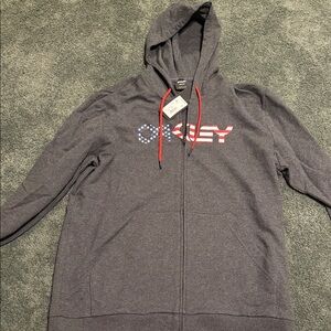 Oakley Gray Hoodie with Red and Blue Accents